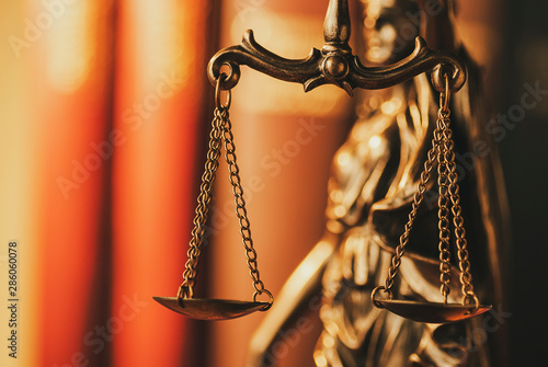 Brass Scales of Justice in a close up view photo