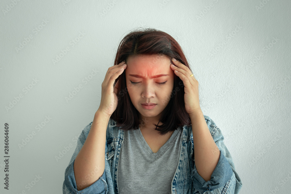 Close up Asia woman having headache.Depression,problem,stressed concept. Close up Asia woman having headache.Depression,problem,stressed concept.