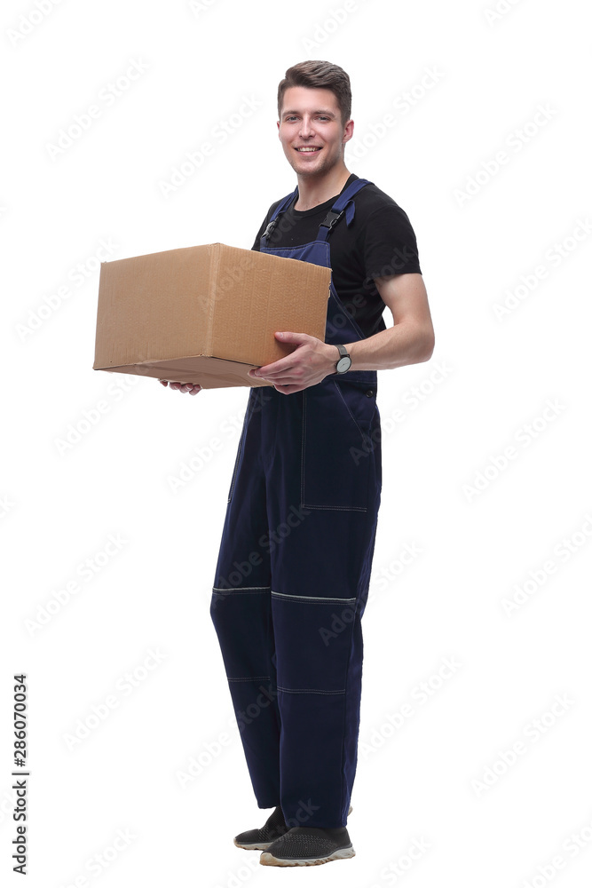 man in overalls with a cardboard box. isolated on white man in overalls with a cardboard box. isolated on white