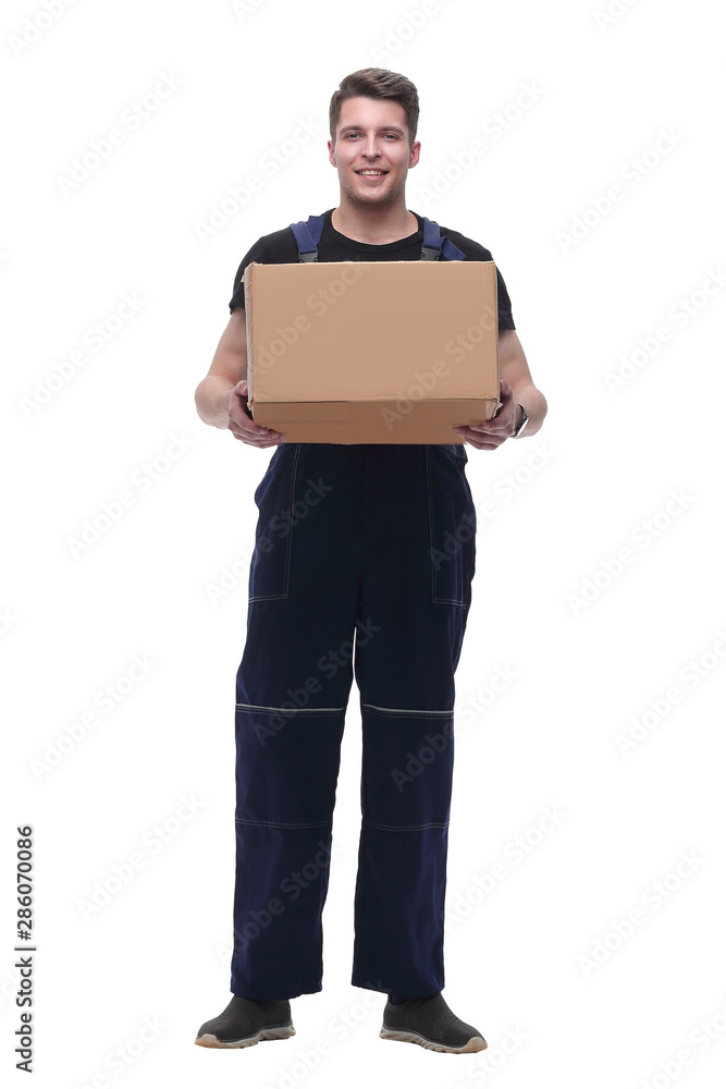 man in overalls with a cardboard box. isolated on white man in overalls with a cardboard box. isolated on white