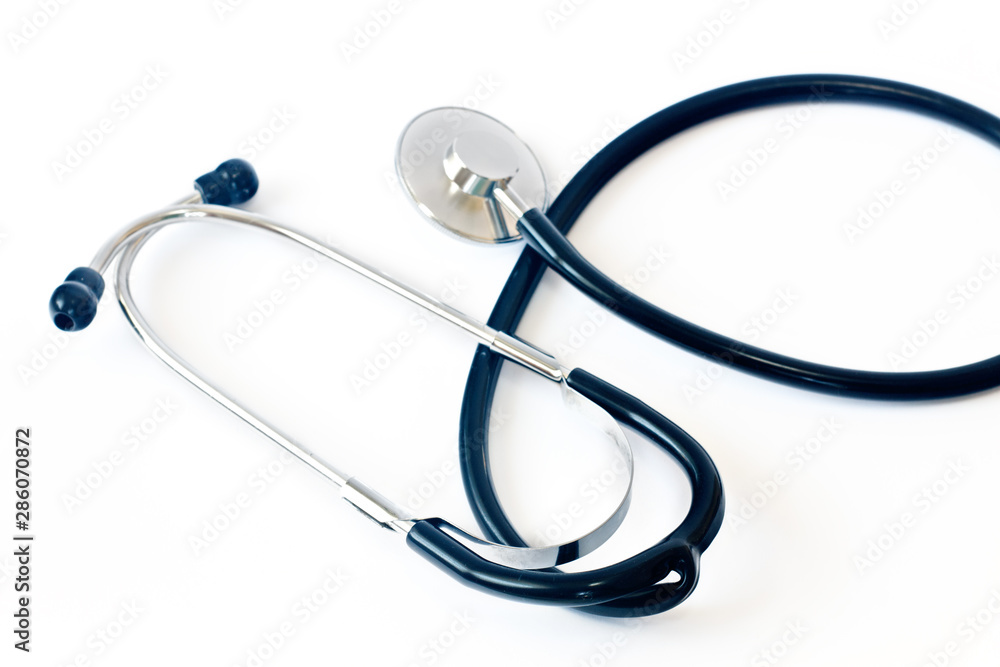 Black stethoscope. Healthcare. Close up view of black stethoscope on white Black stethoscope. Healthcare. Close up view of black stethoscope on white
