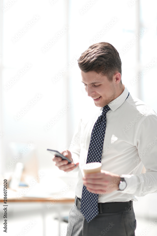 young employee reading email during work break young employee reading email during work break