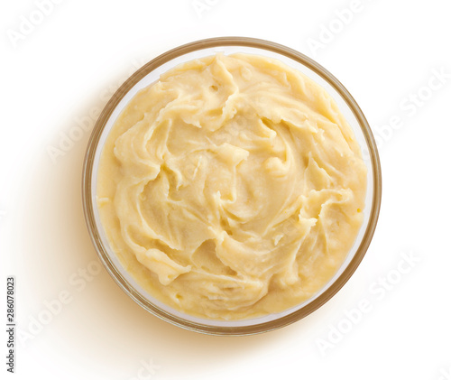 Mashed potatoes isolated on white background, top view