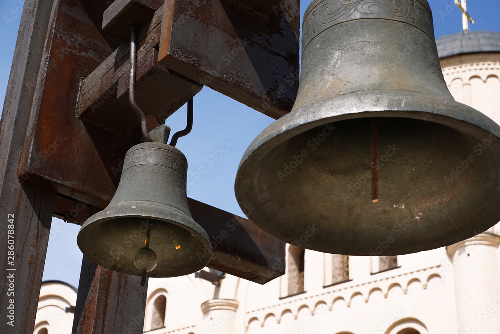 Fototapeta premium Two church bells weighs. Horizontal shot.