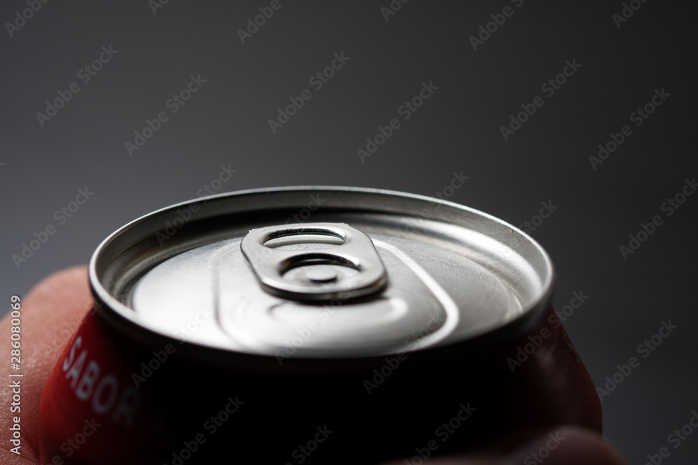 Can of cold soda unopened. Cold soft drinks with excess sugar, closed. Not healthy. Cold drinks. Can of cold soda unopened. Cold soft drinks with excess sugar, closed. Not healthy. Cold drinks.