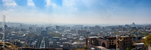 view of the city of Yerevan from the observation deck on a sunny day with clouds in the sky.