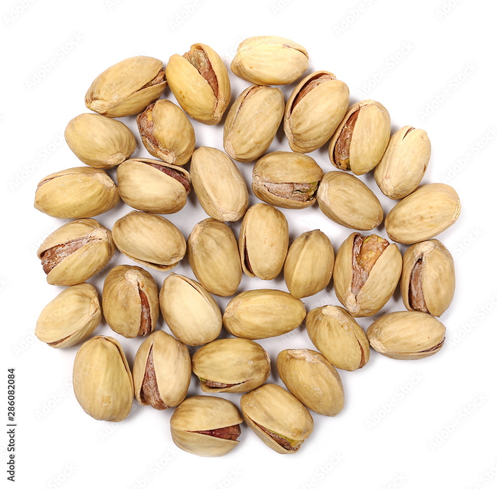 Pistachios isolated on white background, top view Pistachios isolated on white background, top view