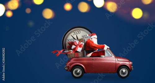 Christmas countdown arriving. Santa Claus on car delivering New Year gifts and clock at blue background