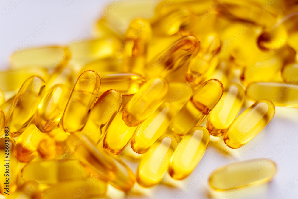 Fish oil capsules pills heap