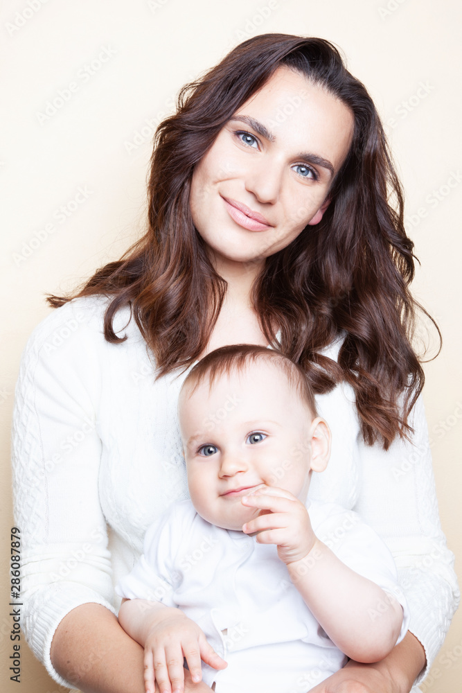 Portrait of small cute baby with mother Portrait of small cute baby with mother