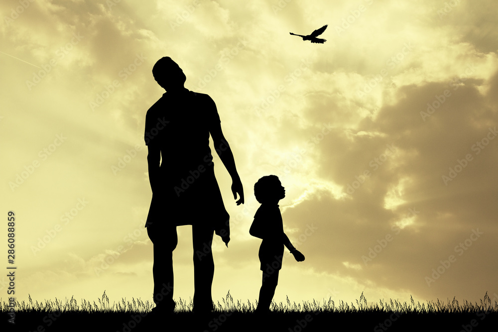 father with his child look at the sky at sunset father with his child look at the sky at sunset