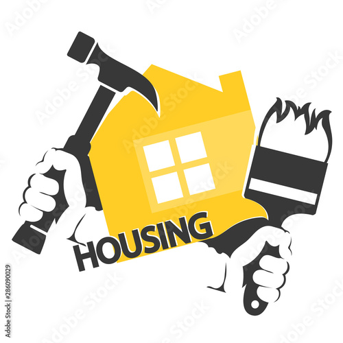 Housing repair symbol hammer and brush tool in hand