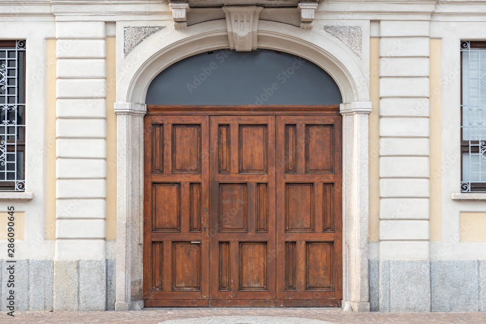 wooden arched house door Monza, Europe wooden arched house door Monza, Europe