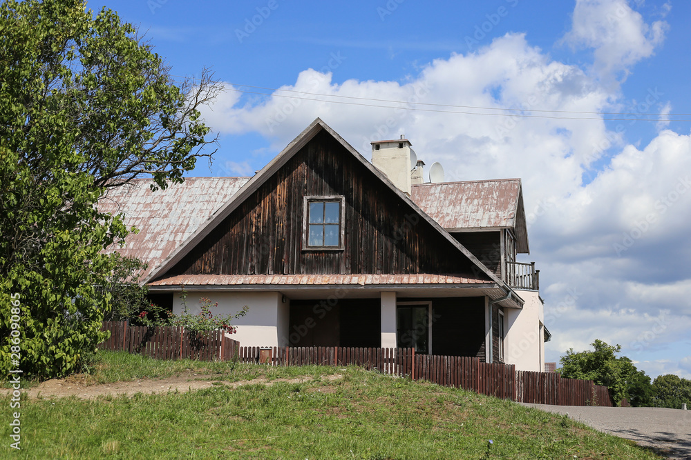 Typical brown house in Lithuania, Trakai. Antique old house with old wood Typical brown house in Lithuania, Trakai. Antique old house with old wood