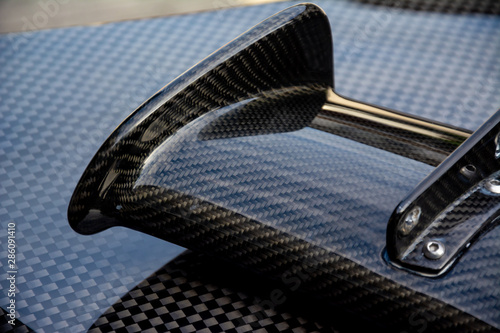 Fototapete Carbon fiber composite product for motor sport and automotive racing