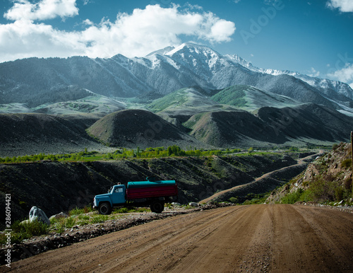 truck on the road in the mountains