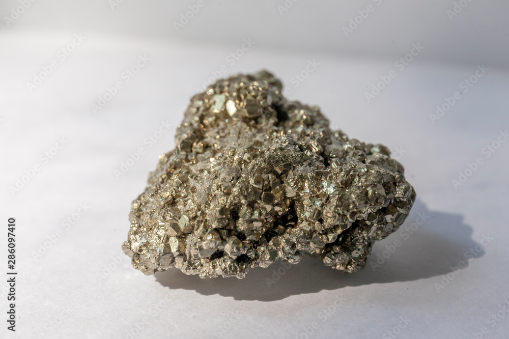 Mineral in the sunlight on a white background Mineral in the sunlight on a white background