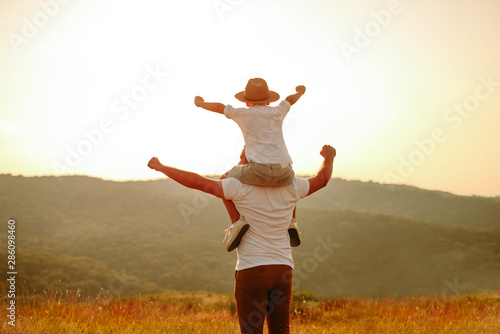 Father and son have fun in nature