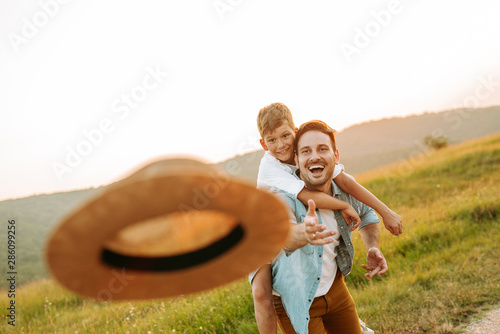Dad and son outdoors