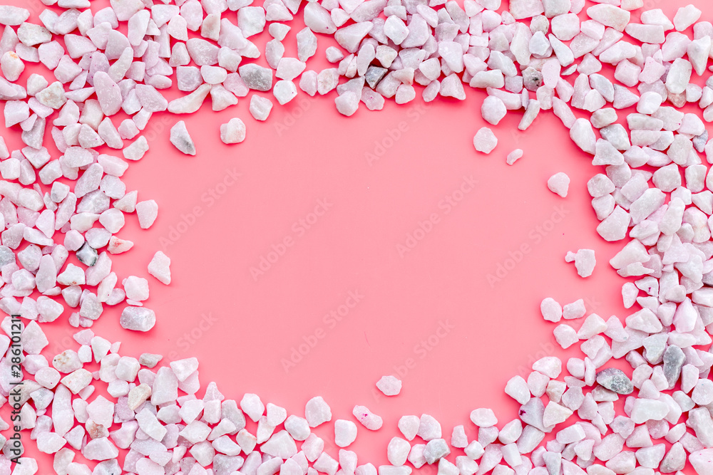 decorative pebble frame for design on pink background top view mockup decorative pebble frame for design on pink background top view mockup