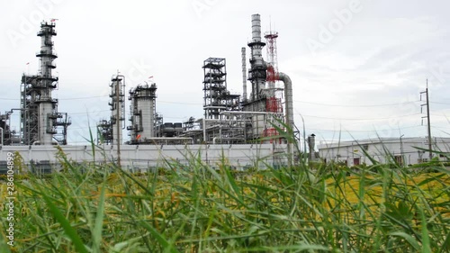 Wallpaper Mural Panning video scenes of Oil and gas Refinery Factory or Petroleum Chemical Industry Plant with green grass at foreground Torontodigital.ca