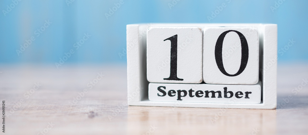 10 September of white Calendar on wood background with copy space for text, World Suicide prevention day. Stop and Save Suicidal concept 10 September of white Calendar on wood background with copy space for text, World Suicide prevention day. Stop and Save Suicidal concept