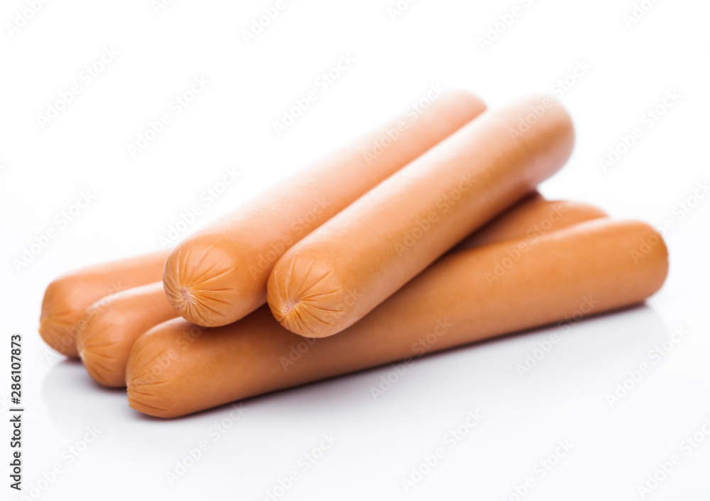 Classic boiled meat pork sausages on white background. Classic boiled meat pork sausages on white background.