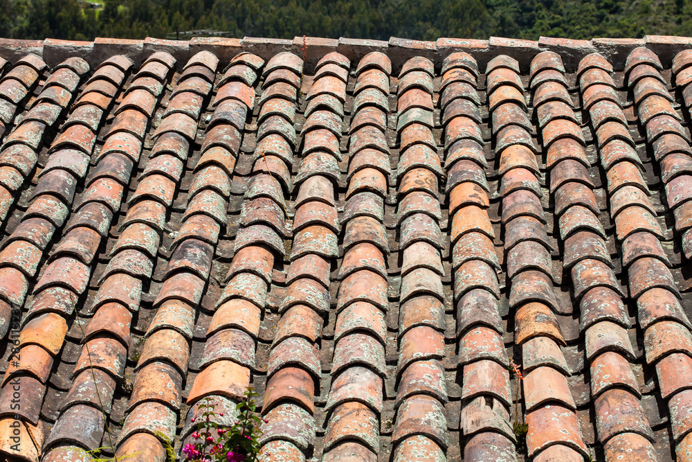 Antique clay roof tiles of the historical houses in the small town of Mongui in Colombia Antique clay roof tiles of the historical houses in the small town of Mongui in Colombia