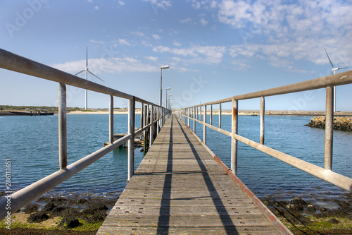 wooden bridge on the sea