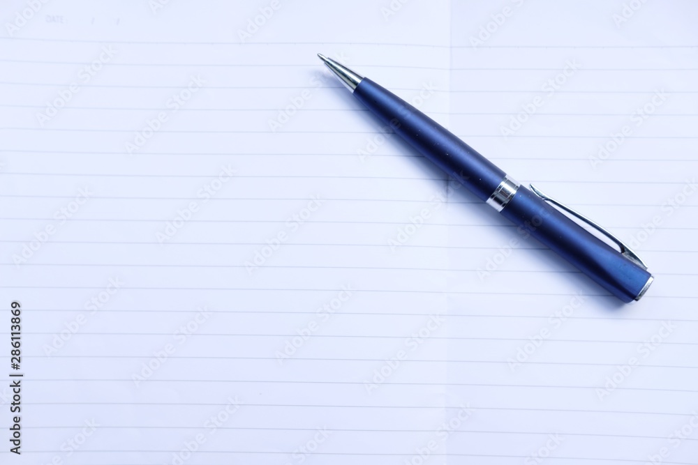 notebook and pen isolated on white background notebook and pen isolated on white background