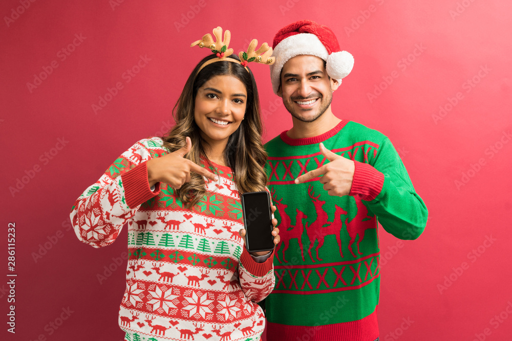 Smiling Boyfriend And Girlfriend With Mobile Phone Smiling Boyfriend And Girlfriend With Mobile Phone