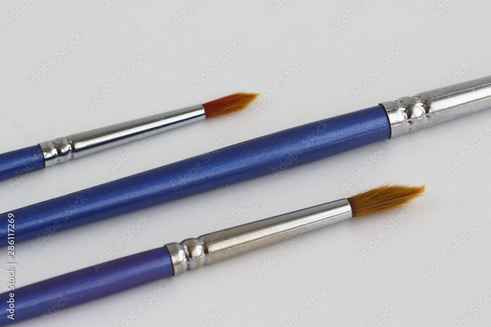several brushes for drawing on a white background several brushes for drawing on a white background