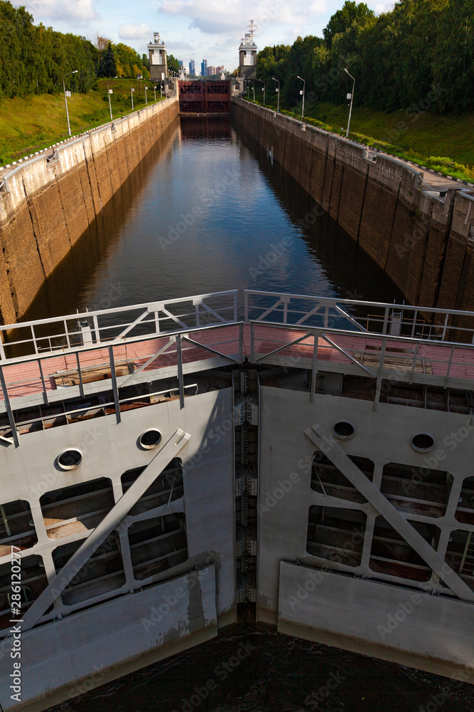 The locks of the shipping channel named after Moscow connecting the Moscow River with the Volga River (vertical image)