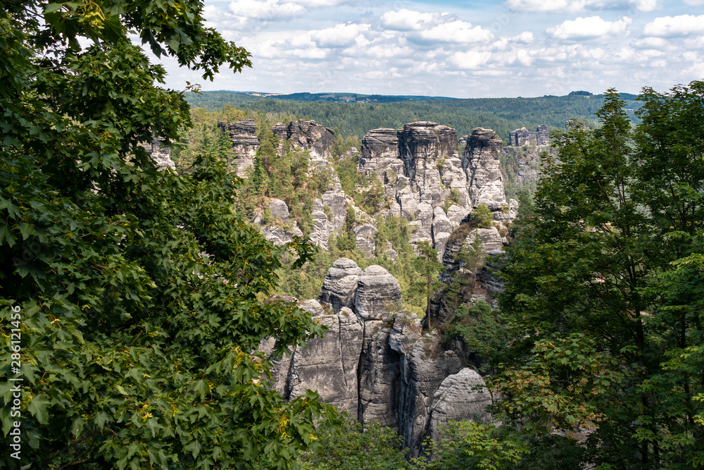Sandstone rock formations as seen from the Bastei Bridge in the Saxon Switzerland.