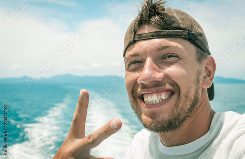 Young man enjoying a sea voyage