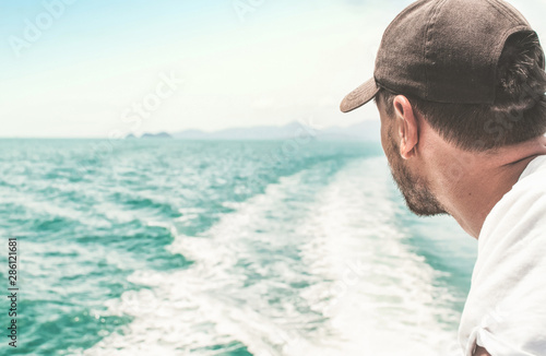Young man enjoying a sea voyage © Irina