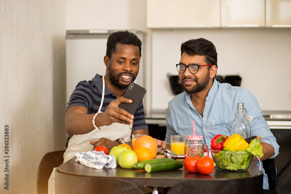 Two men in the kitchen Two men in the kitchen