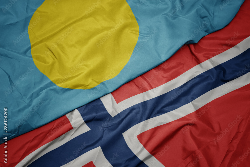 waving colorful flag of norway and national flag of Palau ,.