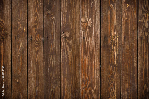 Old wood texture. Abstract pattern. Wooden grain background. Weathered timber. Brown wooden fence in vintage style.