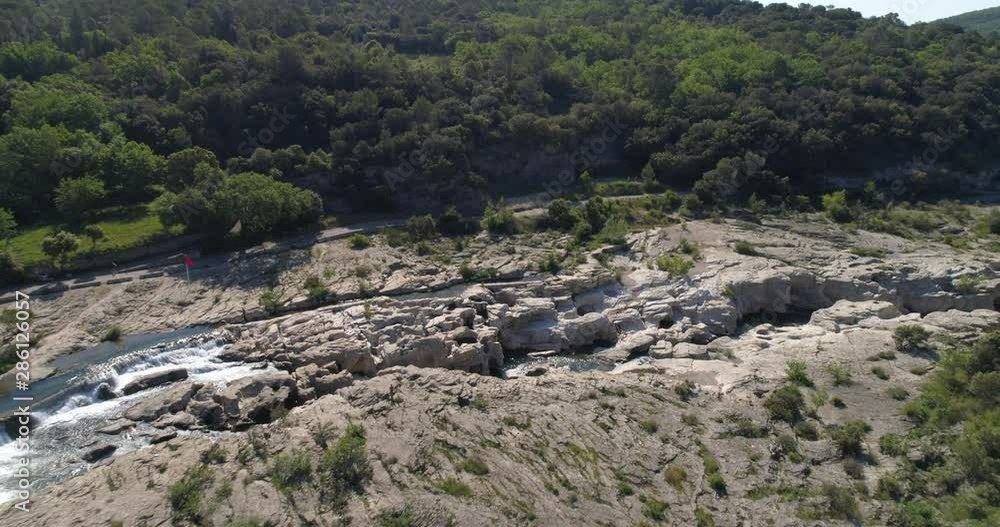 Sautadet waterfall aerial wide approach, la Roque-sur-Cèze, Gard, France Sautadet waterfall aerial wide approach, la Roque-sur-Cèze, Gard, France