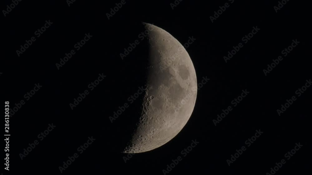 Natural night background with dark sky and half Moon, Earth satellite. Waxing gibbous phase. Natural night background with dark sky and half Moon, Earth satellite. Waxing gibbous phase.