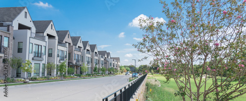 Obraz na płótnie Panoramic brand new park side three story single family houses near Dallas, Texa