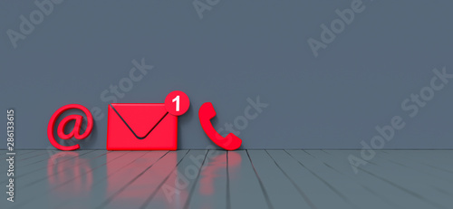 Contact icons leaning against a wall for hotline and service concept