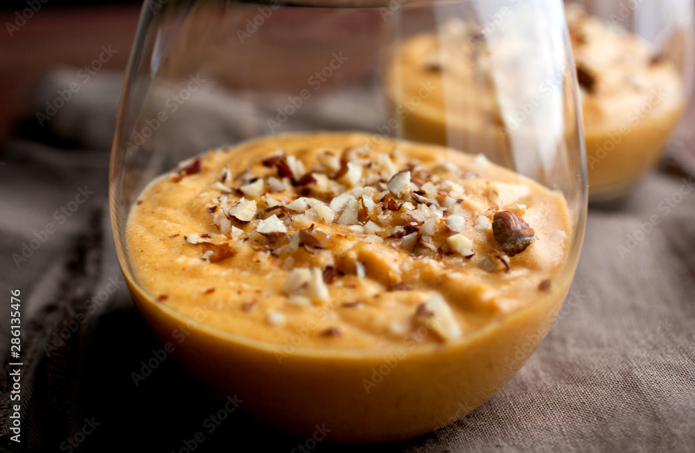 Close up of pumpkin and caramel mousse in glass Close up of pumpkin and caramel mousse in glass