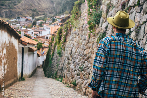 Man walking down the street in Cusco, Peru 