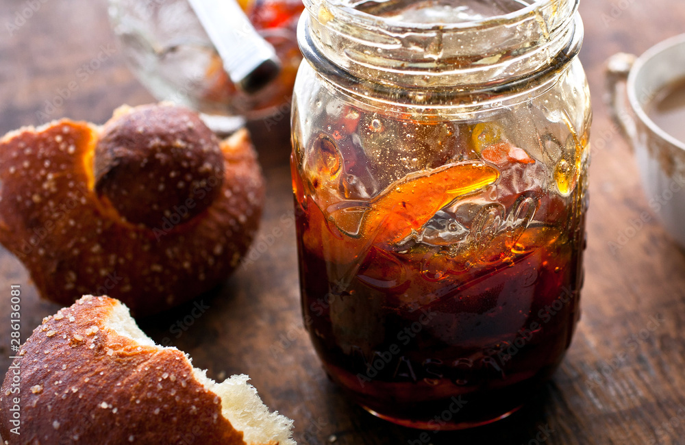 Close up of nectarine lemon verbena jam with bread on table Close up of nectarine lemon verbena jam with bread on table