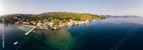 Greece, Aegean Sea, Pagasetic Gulf, Peninsula Pelion, Sound of Trikeri, Aerial view of Chorto in the evening photo