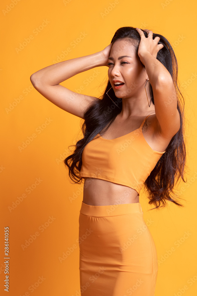 Stressed young Asian businesswoman scream out. Stressed young Asian businesswoman scream out.