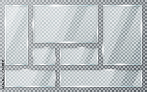 Glass plates set on transparent background. Acrylic and glass texture with glares and light. Realistic transparent glass window in rectangle frame photo