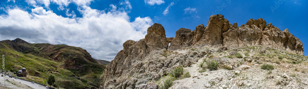 Dogubayazıt, Turkey, Middle East: panoramic view of the road up to the rocky mountains with a little mosque located near the famous Ishak Pasha Palace and to the ancient castle of Old Beyazit 